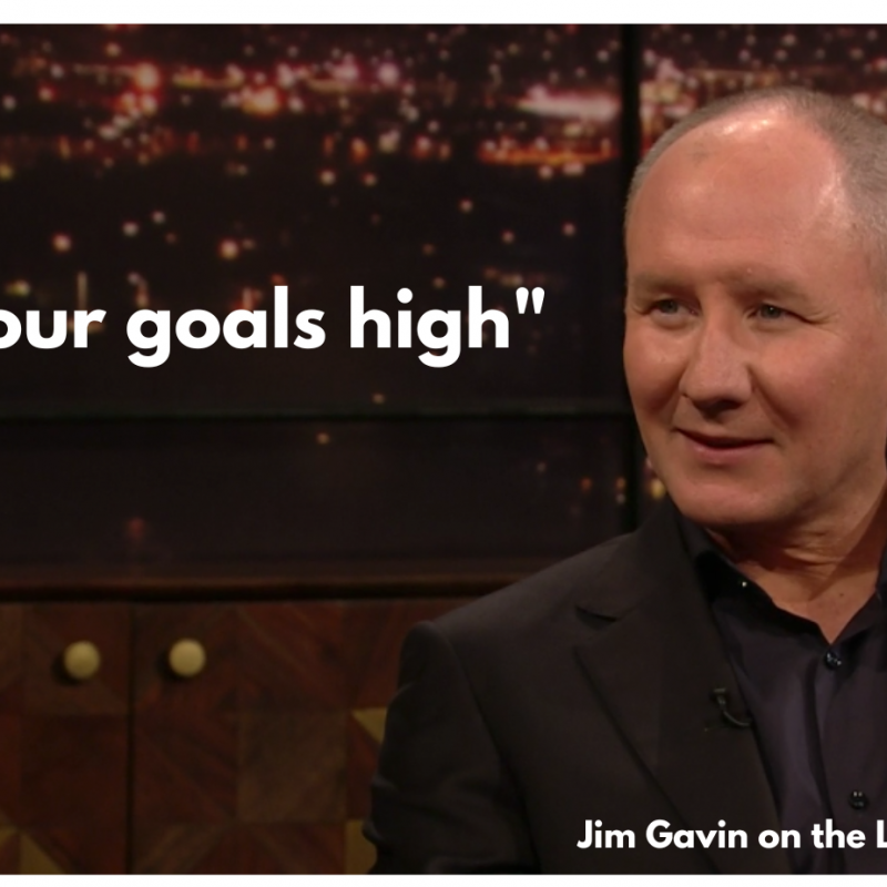 Jim Gavin is seen from the chest up, with a quote to his right that says" Set your Goals High", an outtake from his interview